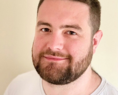 Man with short hair and beard