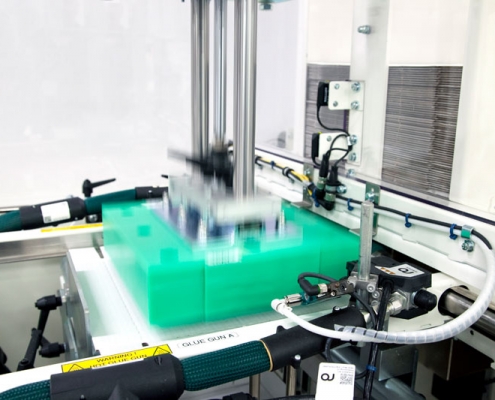 Automated machinery in motion.